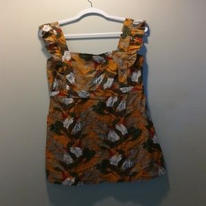 Yellow patterned dress with ruffled shoulders